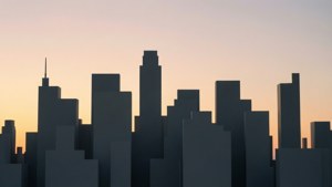 Siluetă plată a orizontului urban la apus.