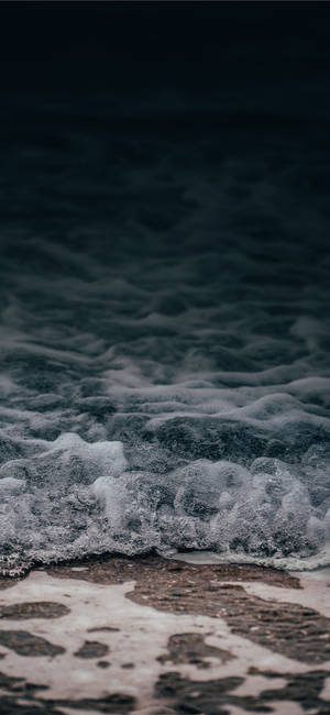 Wallpaper valuri de suprafață close-up pentru seria iPhone 11.