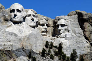 Soarele Strălucind pe Mount Rushmore — Cerul albastru Fundal