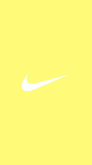 Splash fermecător de estetică galben pastel drăguț cu logo-ul iconic Nike — Estetică galben pastel Fundal