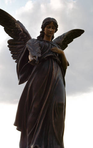 Statuie Înger Comandată de Biserica Catolică — Infinix Xpad GT Fundal