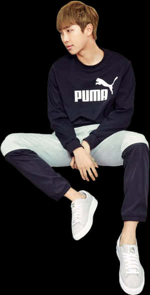 Ținută casual Puma în poziție șezând