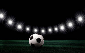 Mingi de fotbol iluminată HD wallpaper. — True Black Fundal